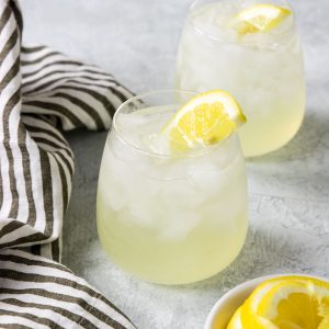 Vodka and Lemonade garnished with a fresh lemon