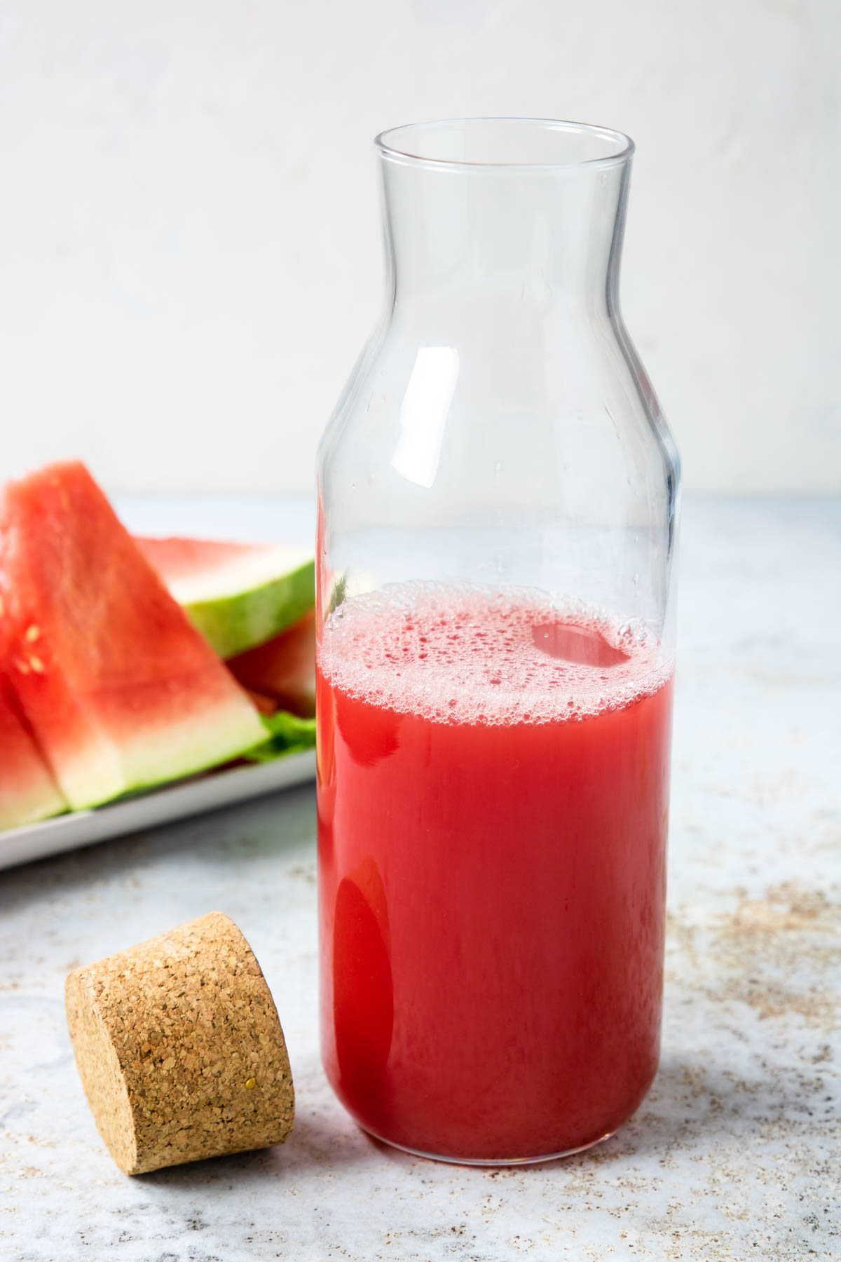 pitcher of fresh watermelon juice, bright pink