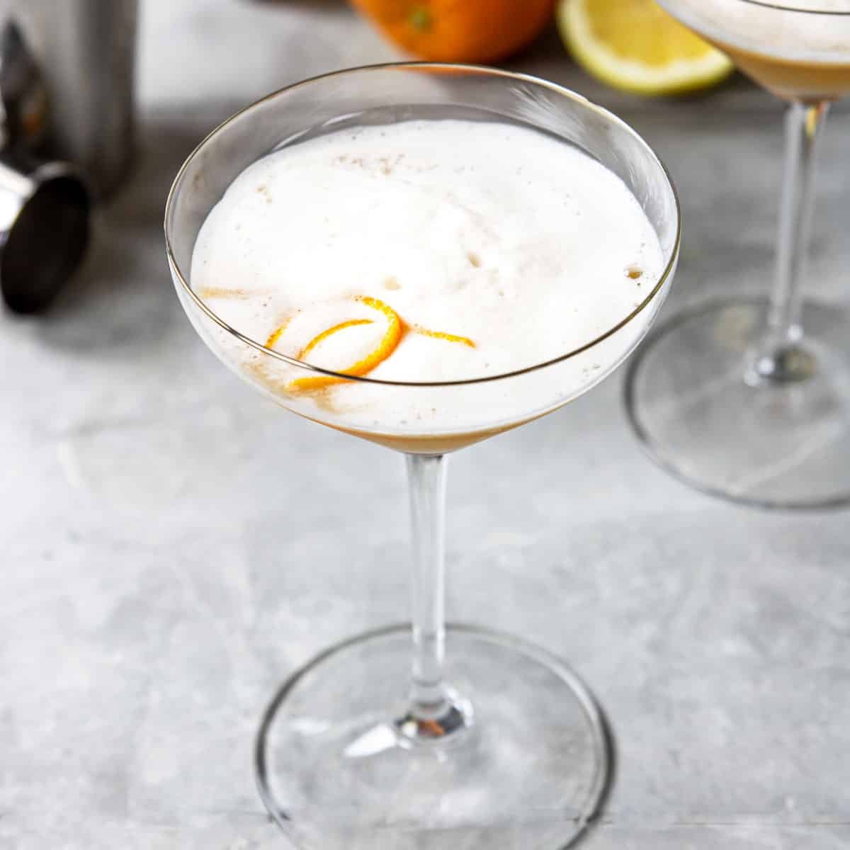 showing the egg white foam on top of a sour cocktail
