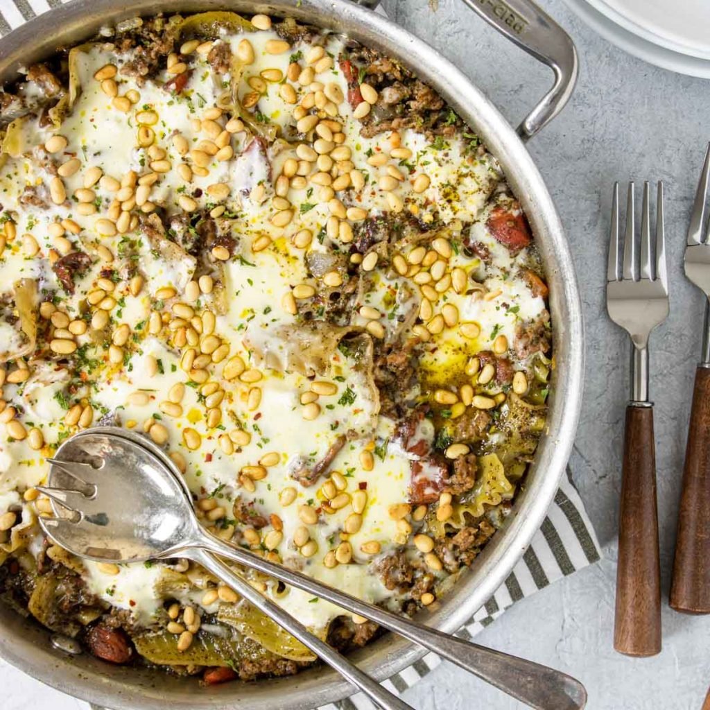 pesto lasagna with mozzarella and pine nuts