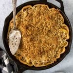 skillet apple pie with crumble topping in a cast iron skillet