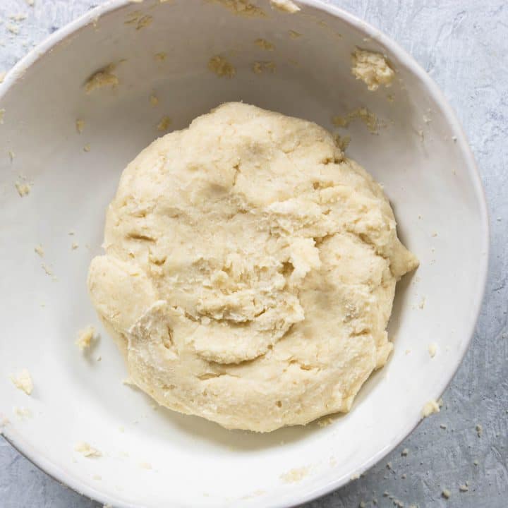 pie crust dough in a white bowl