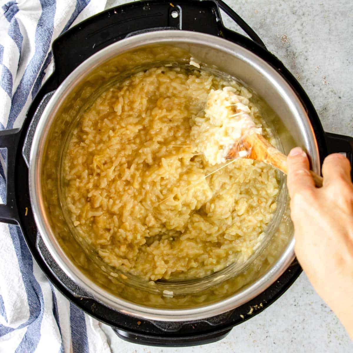 stirring cooked risotto in the instant pot