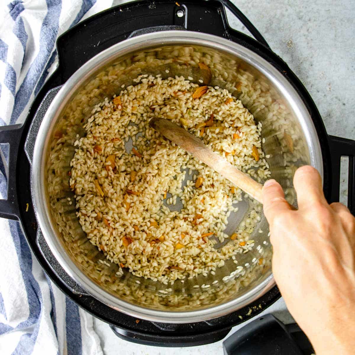 lightly sautéing arborio rice in the instant pot