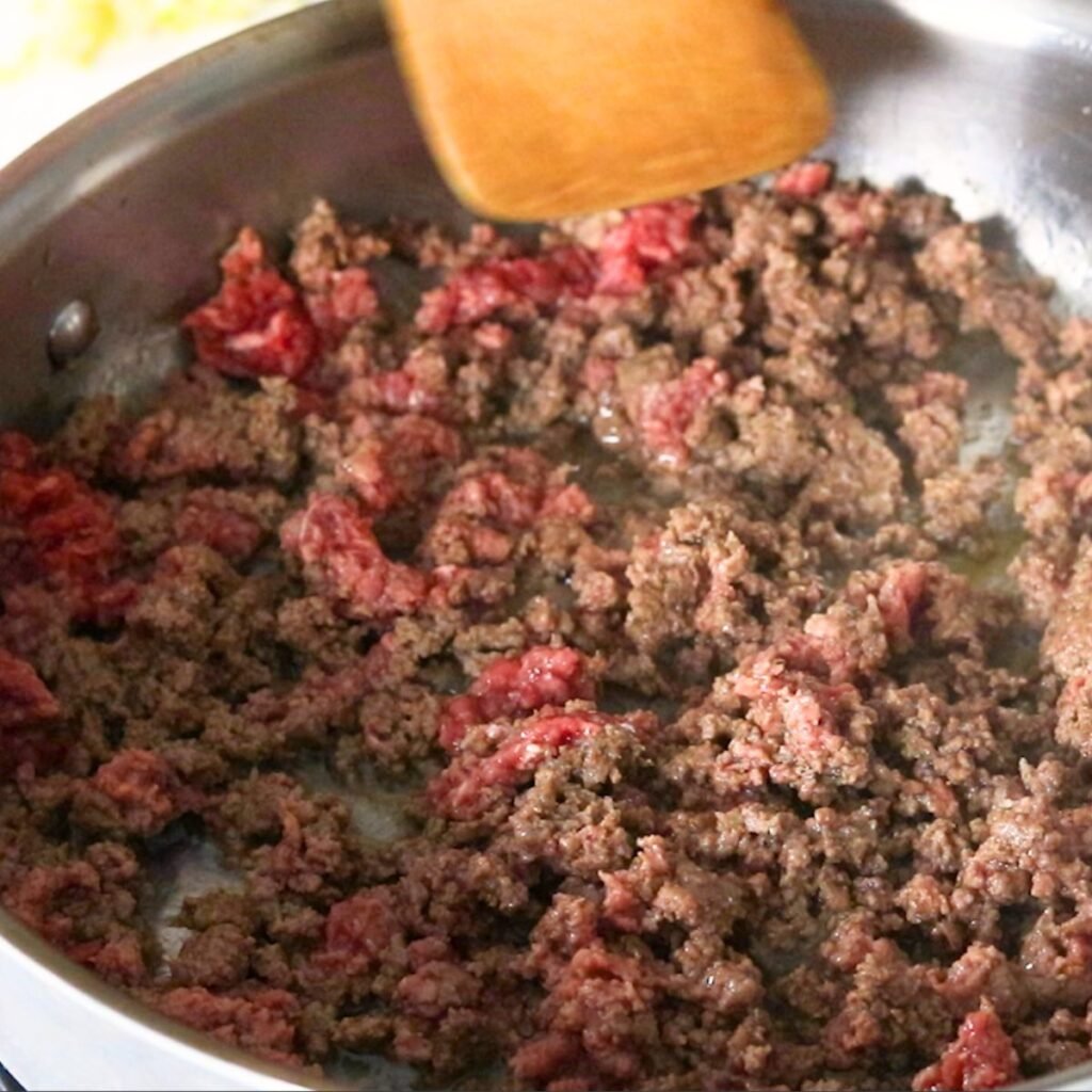 browning ground beef in a skillet