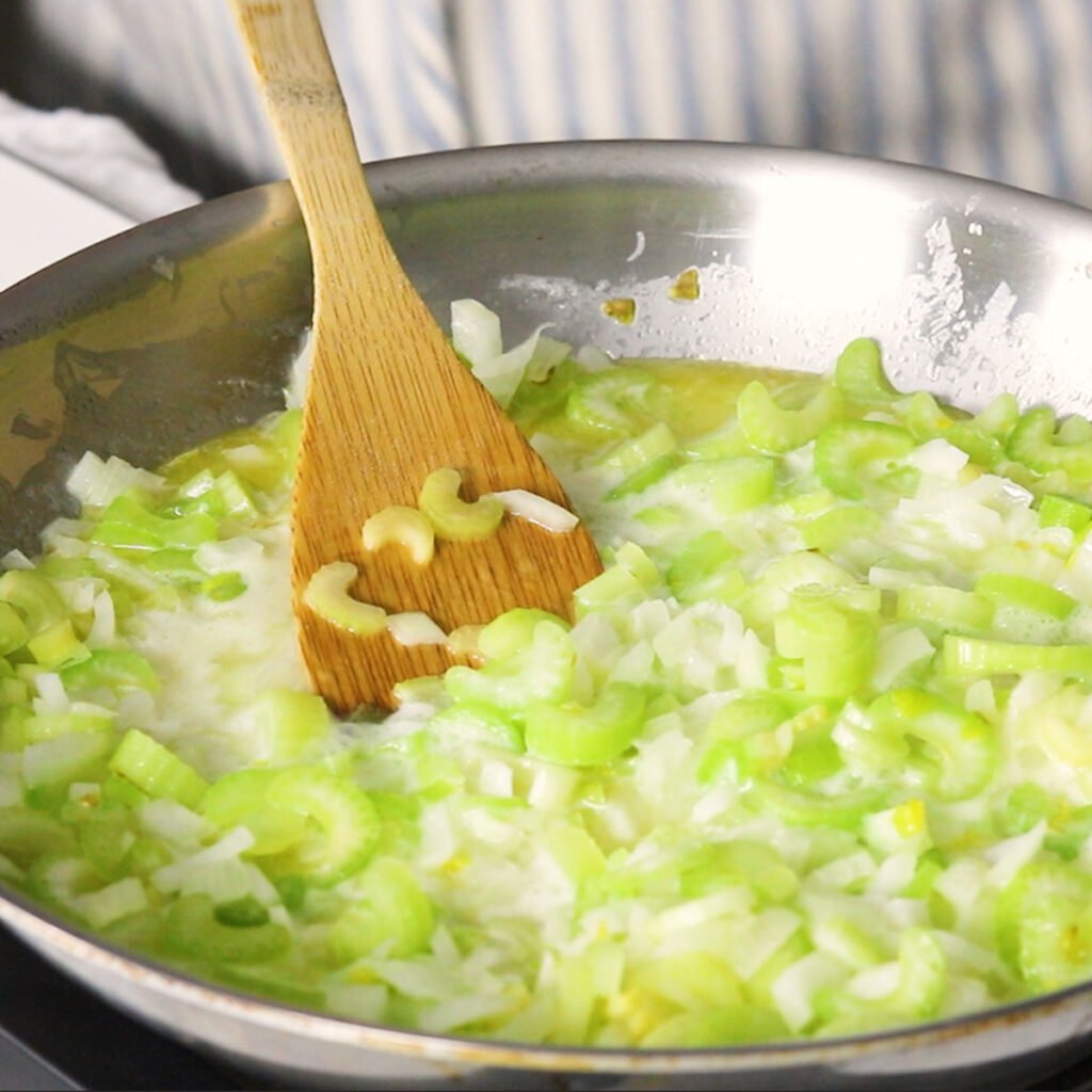 softening onions and celery in butter, in a large skillet.