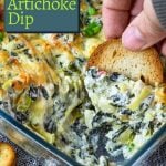 spinach artichoke dip with a bagel chips dipping in and pinterest text