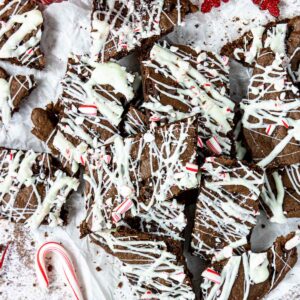 a pile of peppermint brownie brittle and some candy canes