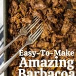 Mexican Shredded Beef (barbacoa) on a pan with forks and pinterest text overlay