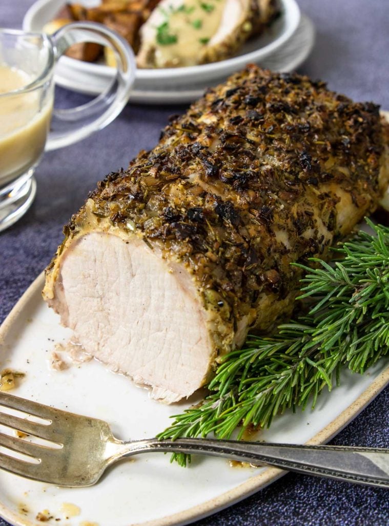 roasted pork loin topped with a garlic and rosemary mixture