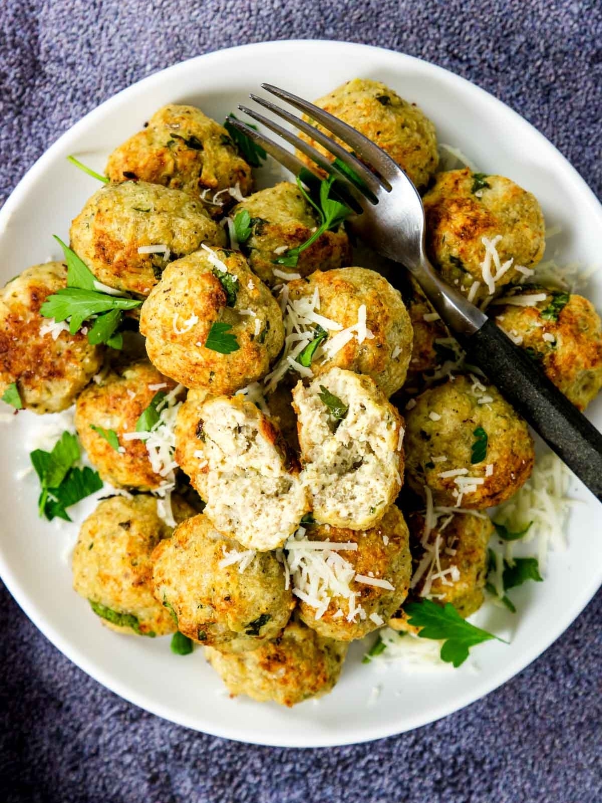 a plate of baked chicken meatballs