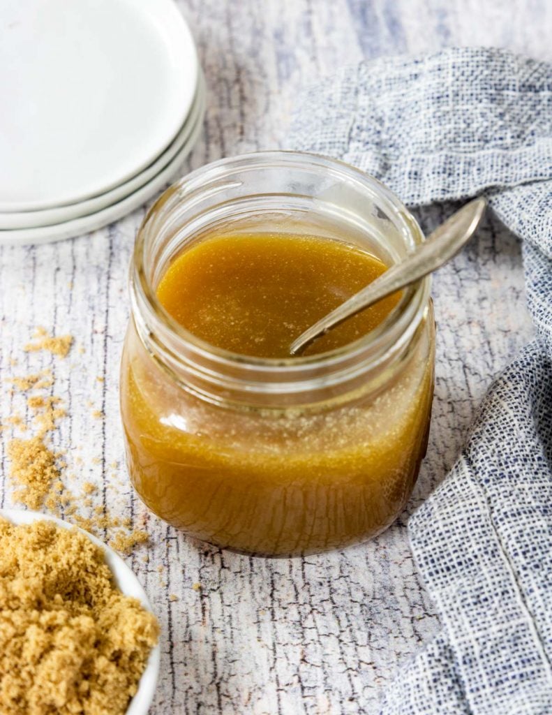 a mason jar full of butter rum sauce