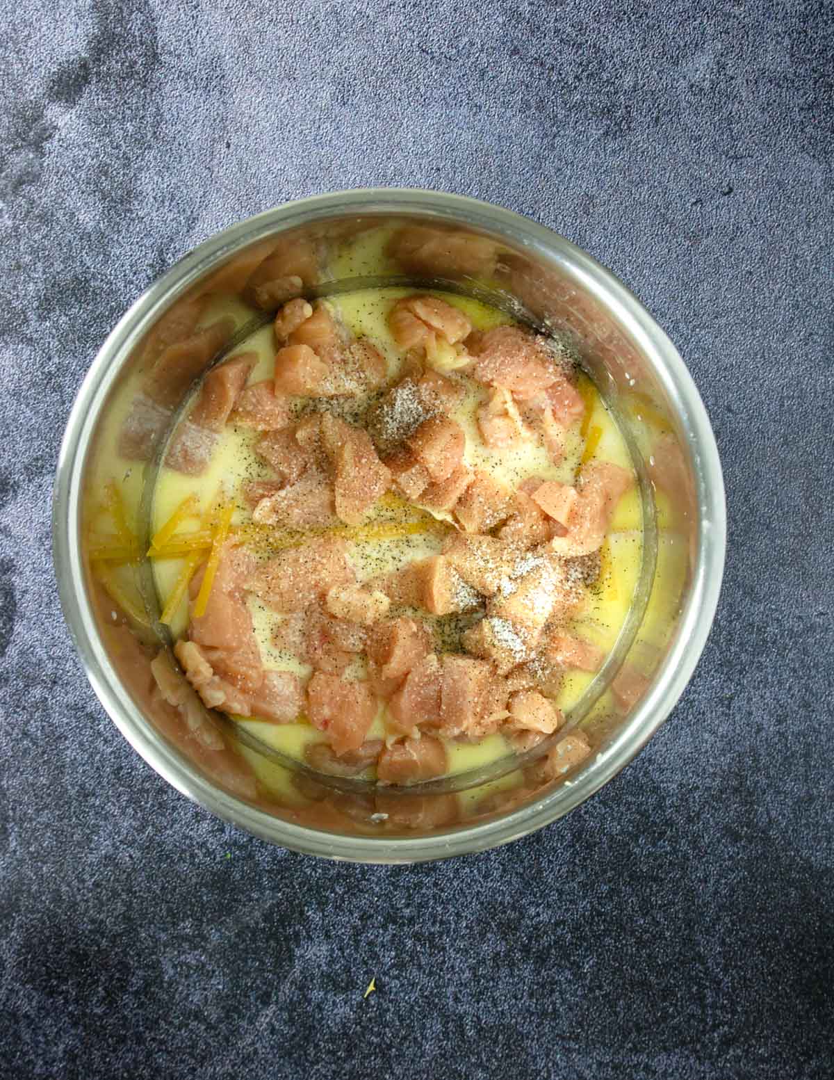 chicken on top of the fettuccine in the instant pot