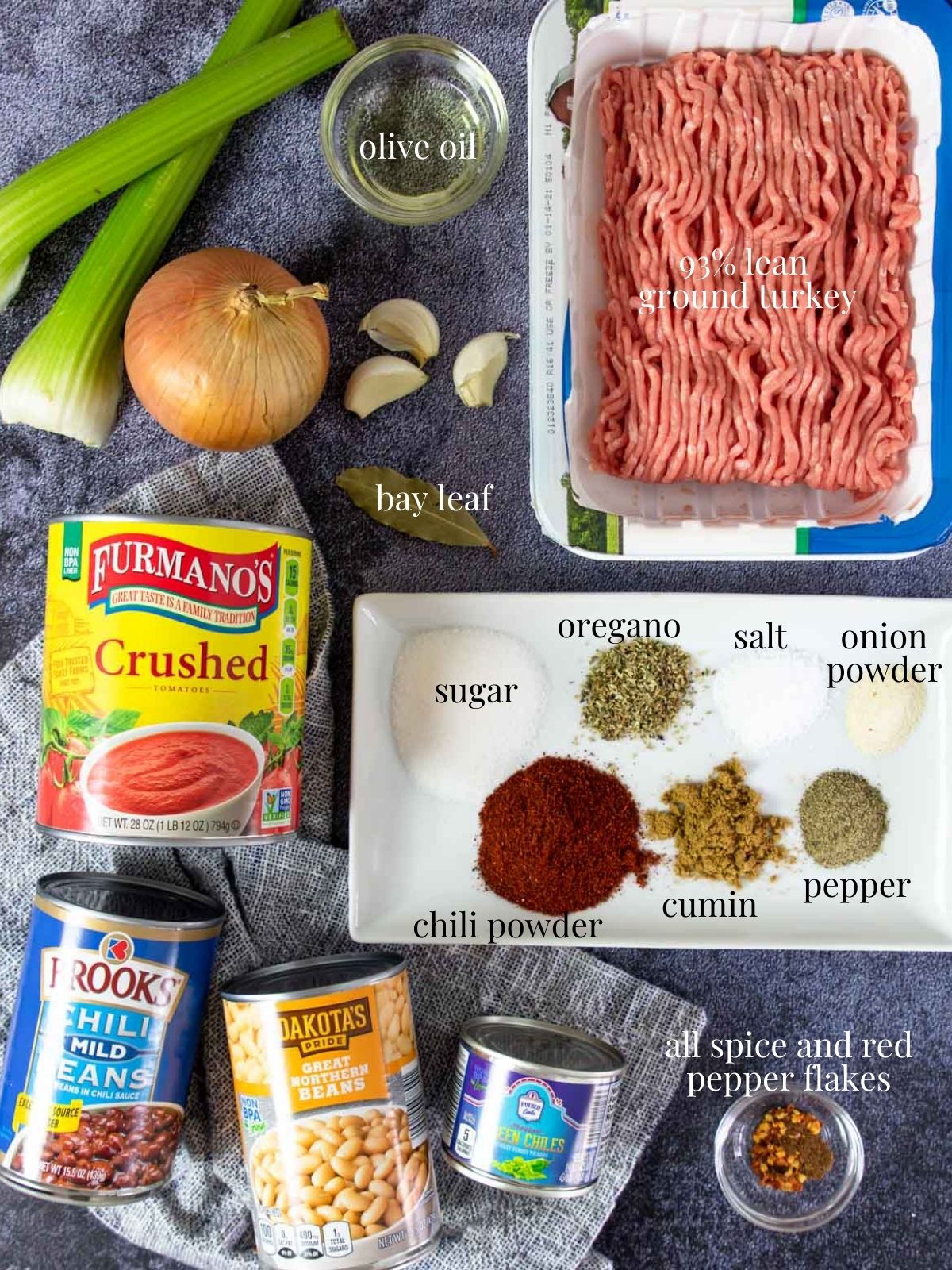 all the ingredients for turkey chili on a table