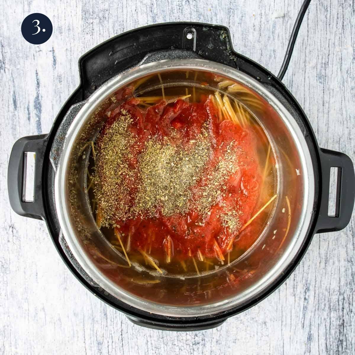 marinara sauce on top of spaghetti in the instant pot