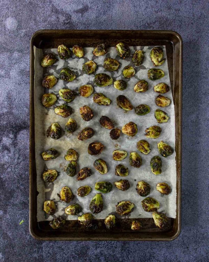 roasted brussels sprouts on a baking sheet