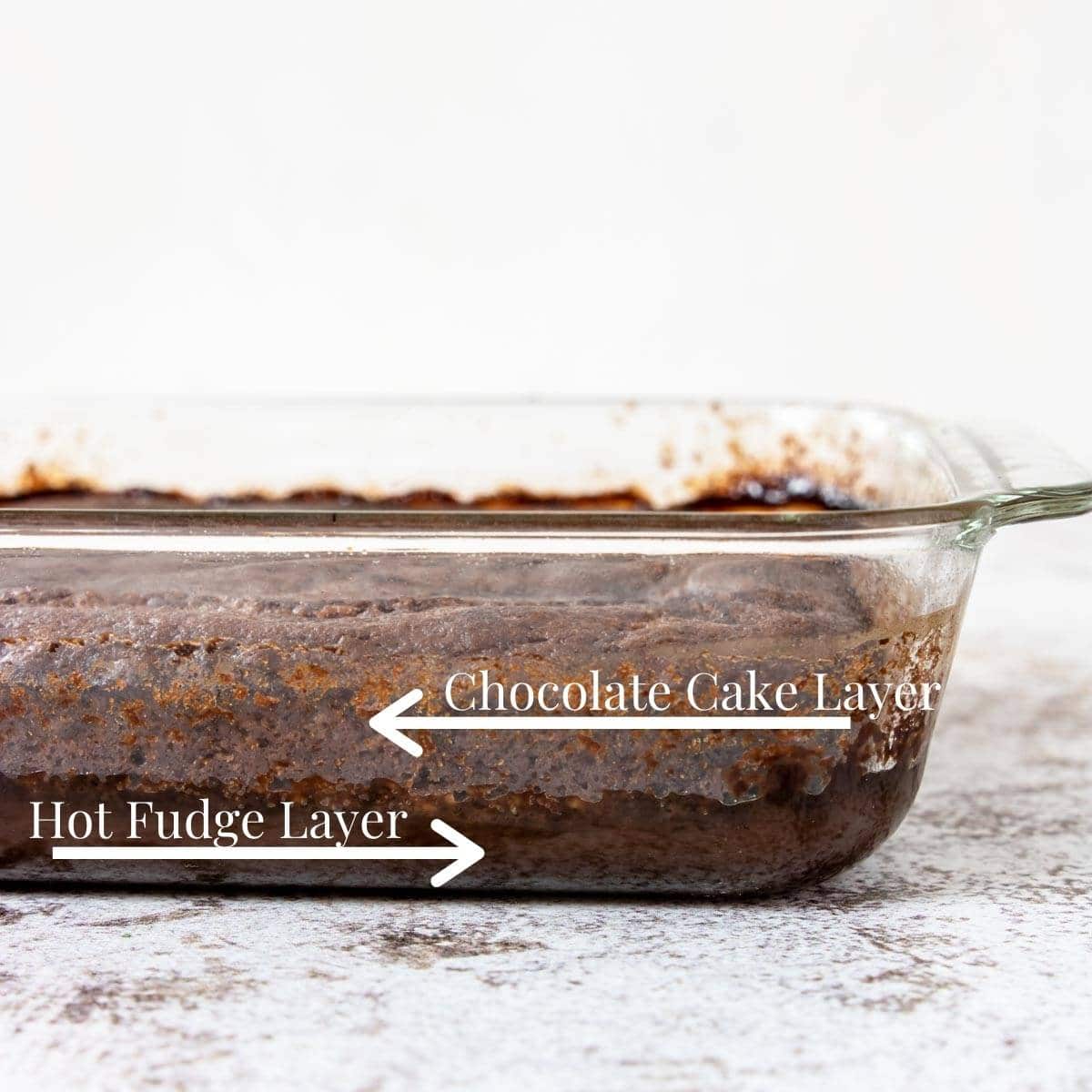showing the layers of pudding cake - hot fudge on bottom and cake on top