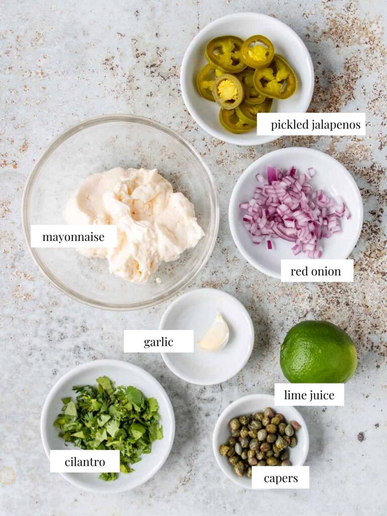 ingredients for jalapeno tartar sauce on a table with labels