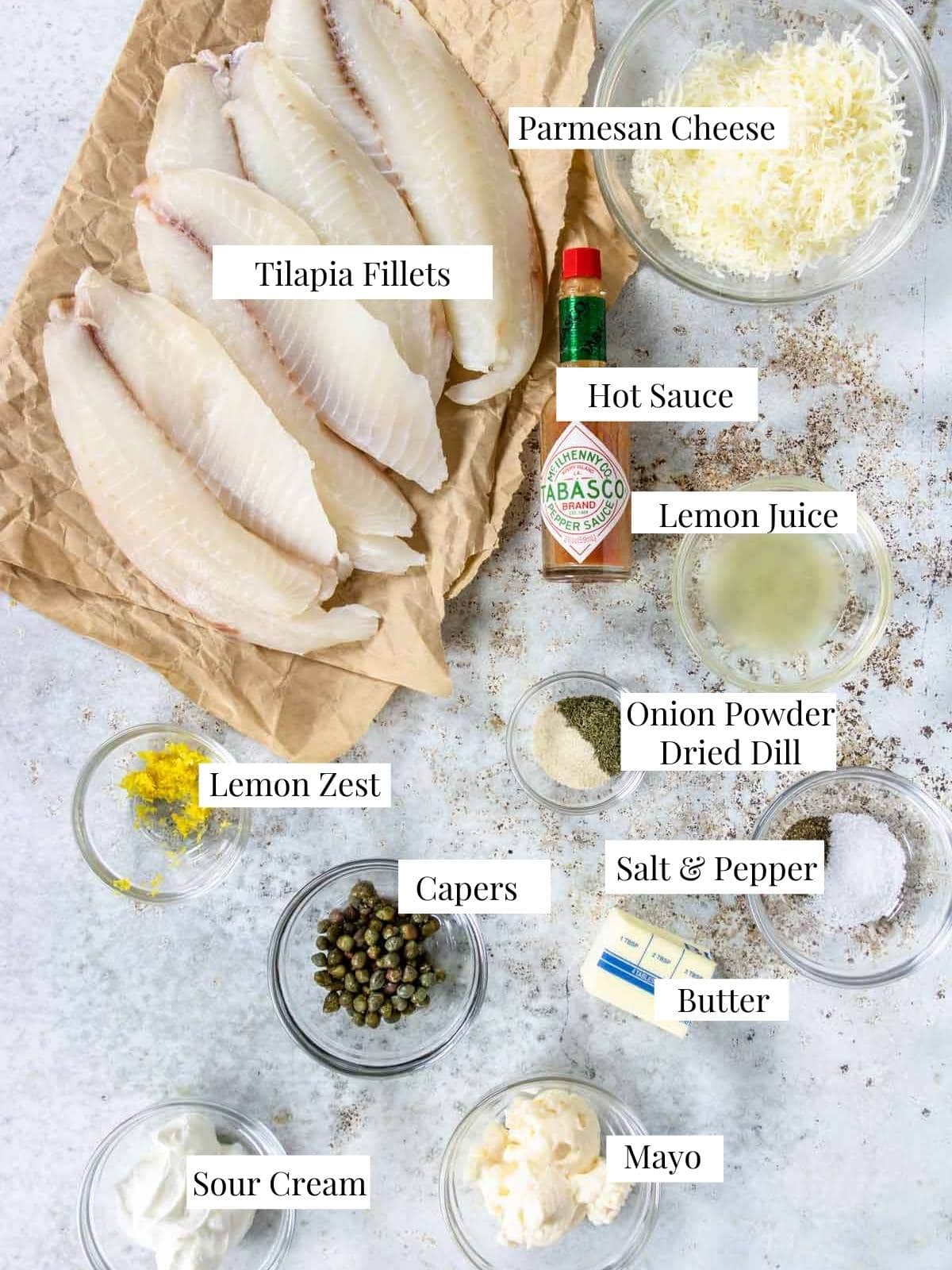 parmesan tilapia ingredients on a table with text labels