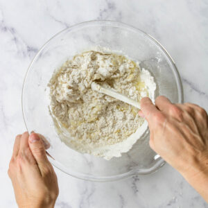 stirring dumpling dough for stew
