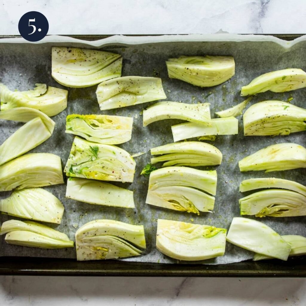 fennel wedges on a baking sheet lined with parchment