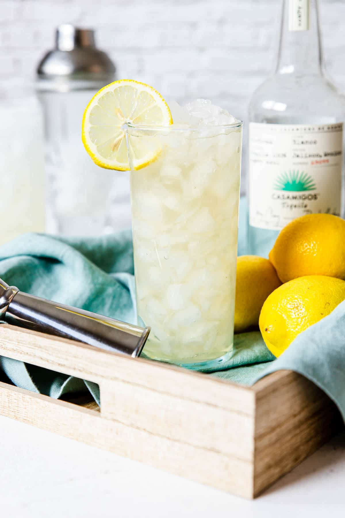 Tequila lemonade in a glass with a lemon wheel