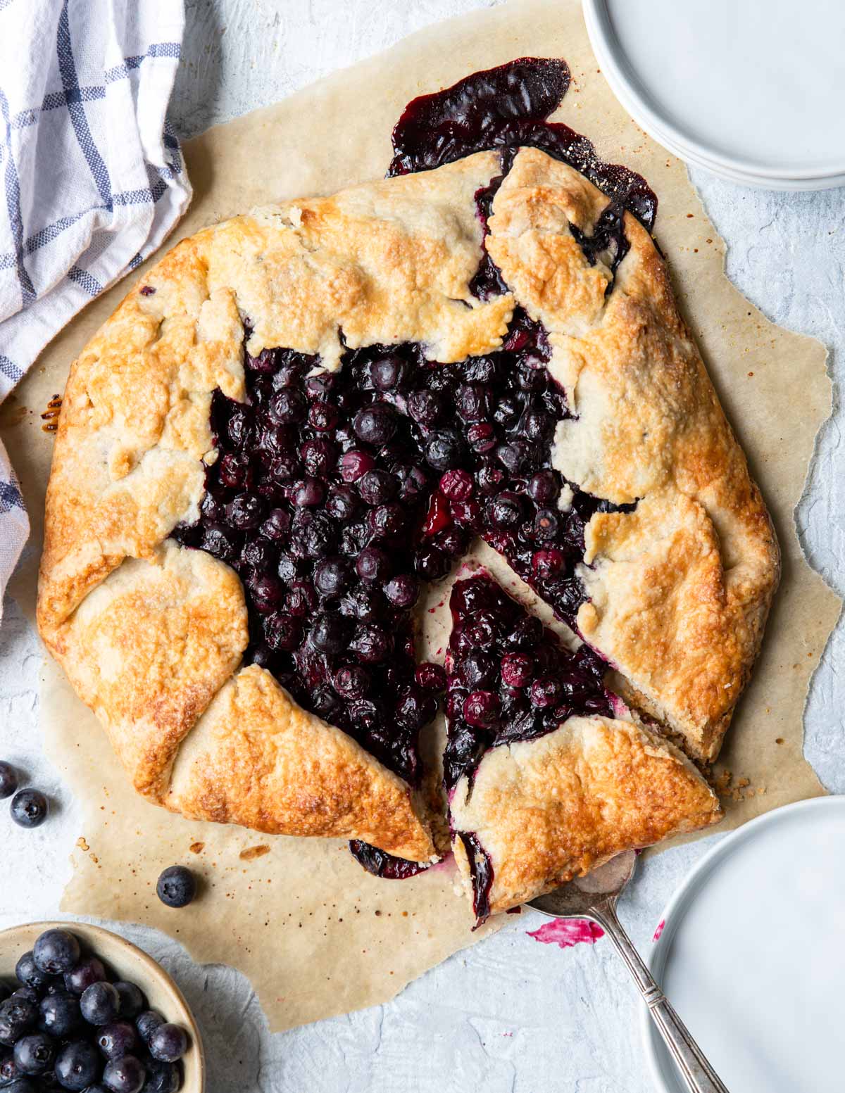 blueberry galette with a slice cut out