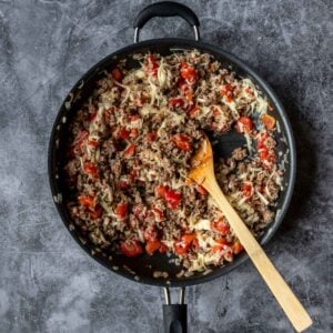 ground beef and ground sausage mixed with diced tomatoes and mozzarella