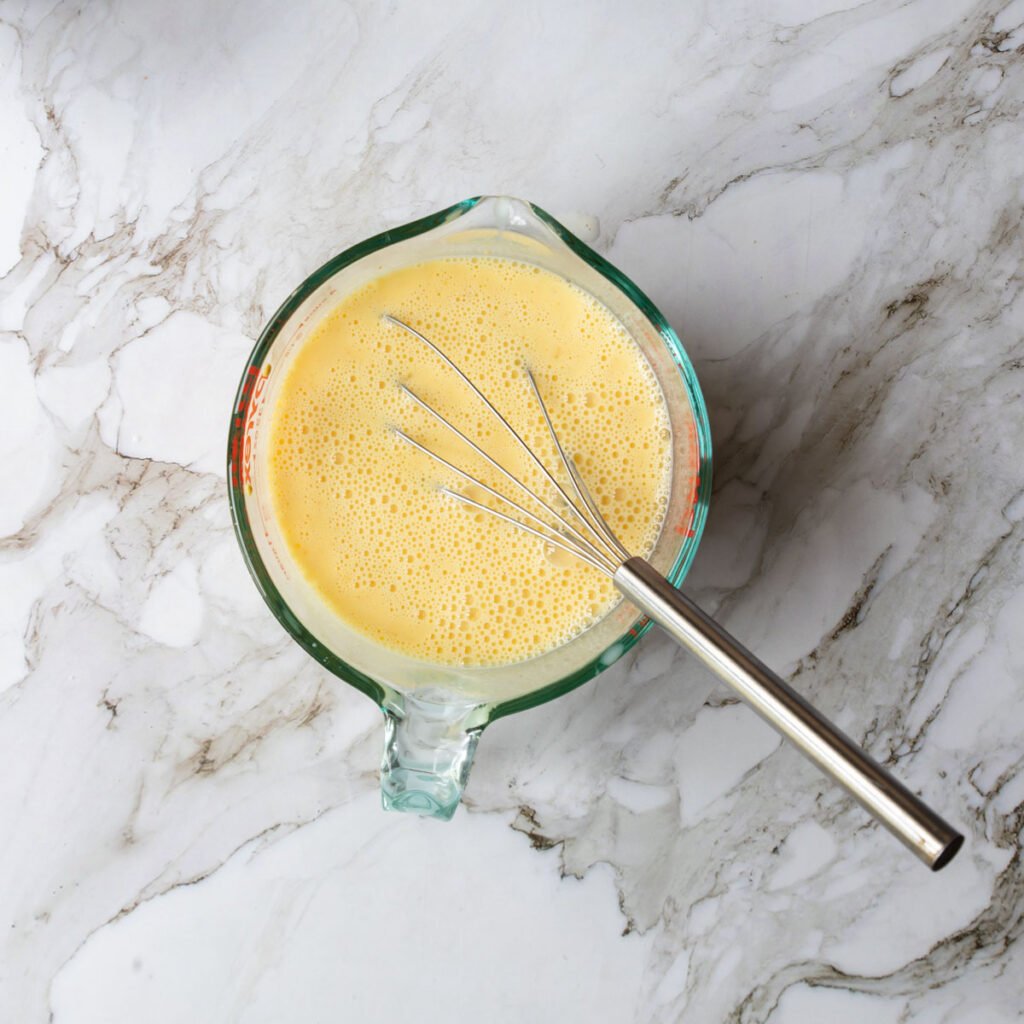 eggs, milk, and seasonings mixed together