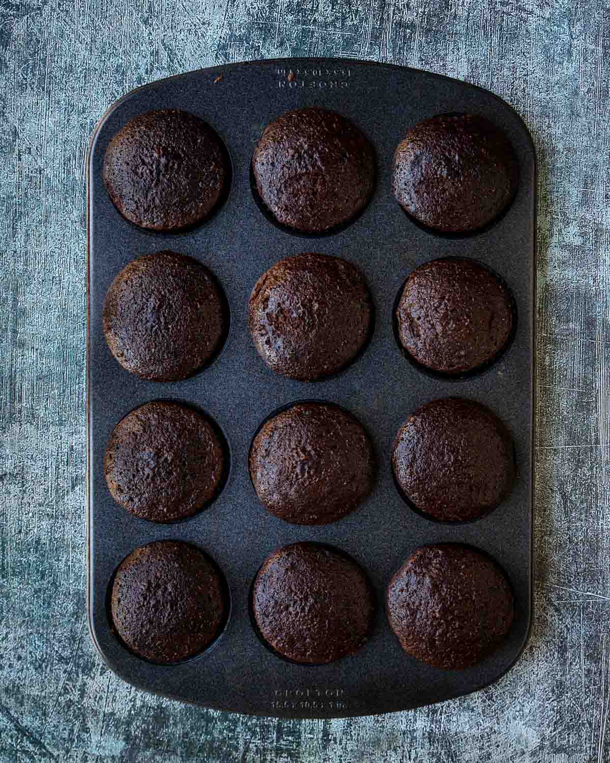 a tray of chocolate cupcakes
