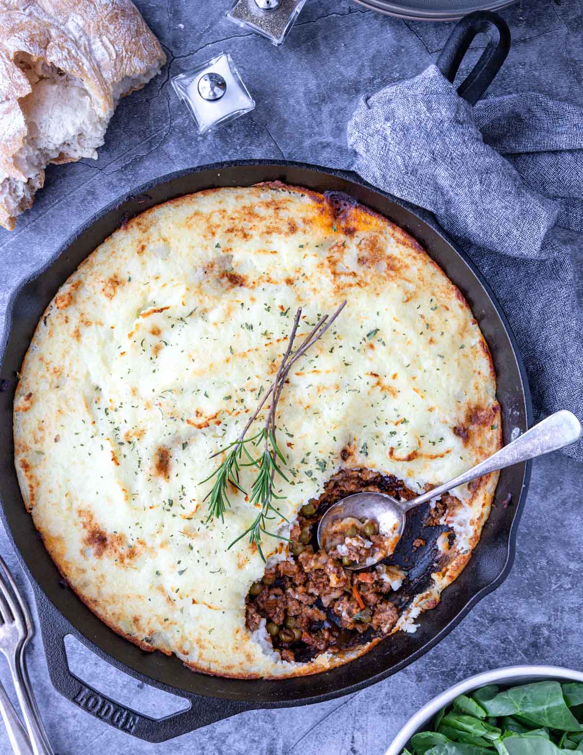 cast iron skillet with turkey shepherd's pie cooked in it