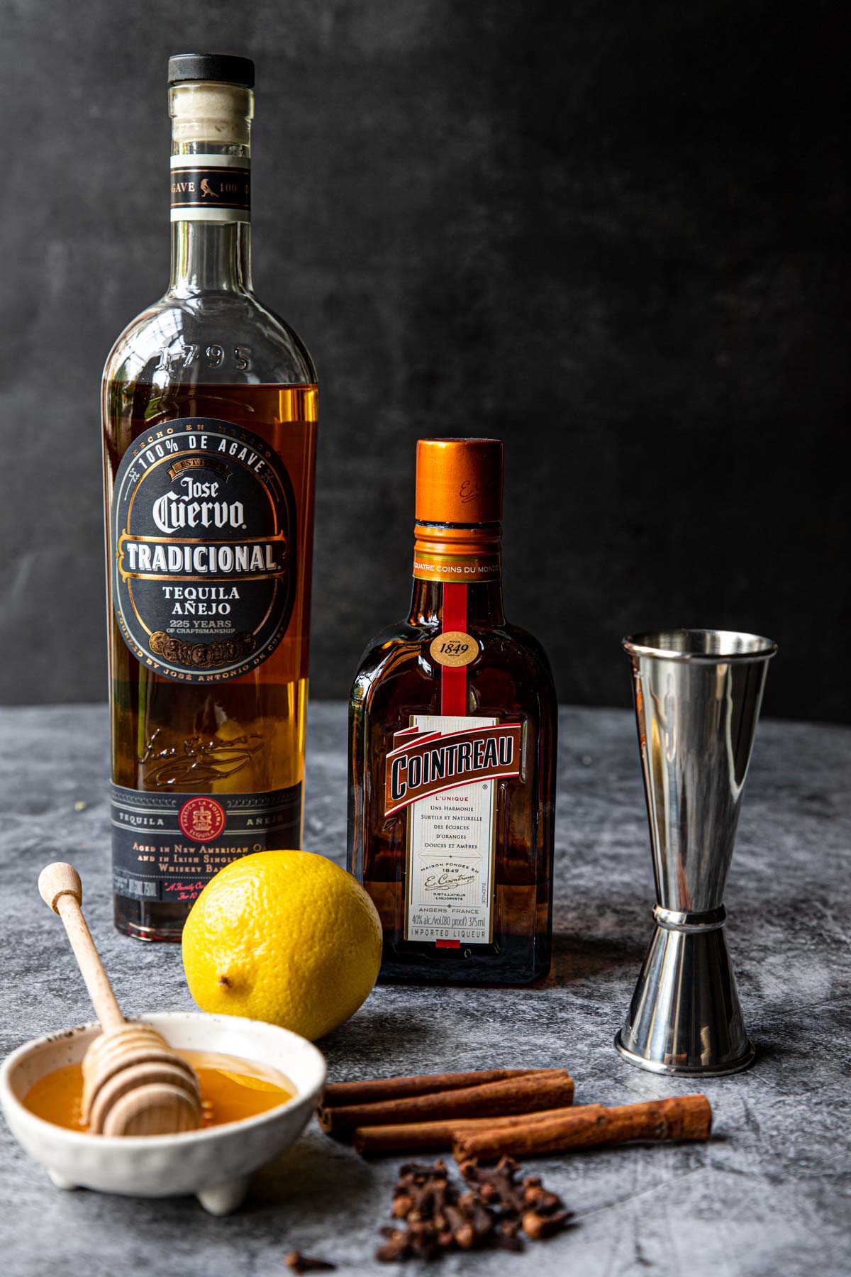 Tequila hot toddy ingredients on a table