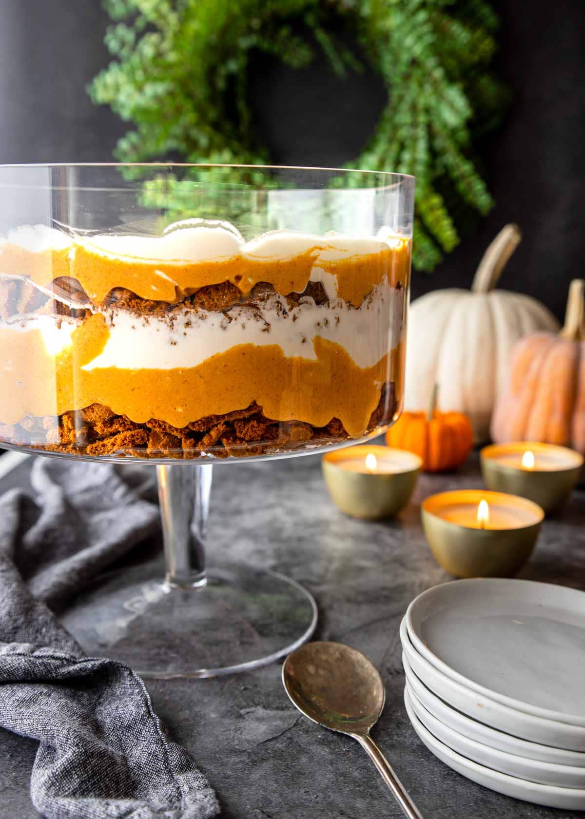 Thanksgiving Trifle in a bowl with layers of pumpkin, whipped cream and biscoff cookies