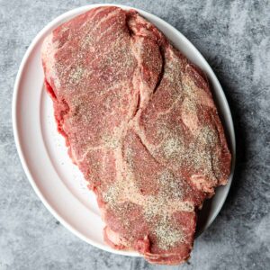 chuck roast seasoned with salt, pepper and onion powder