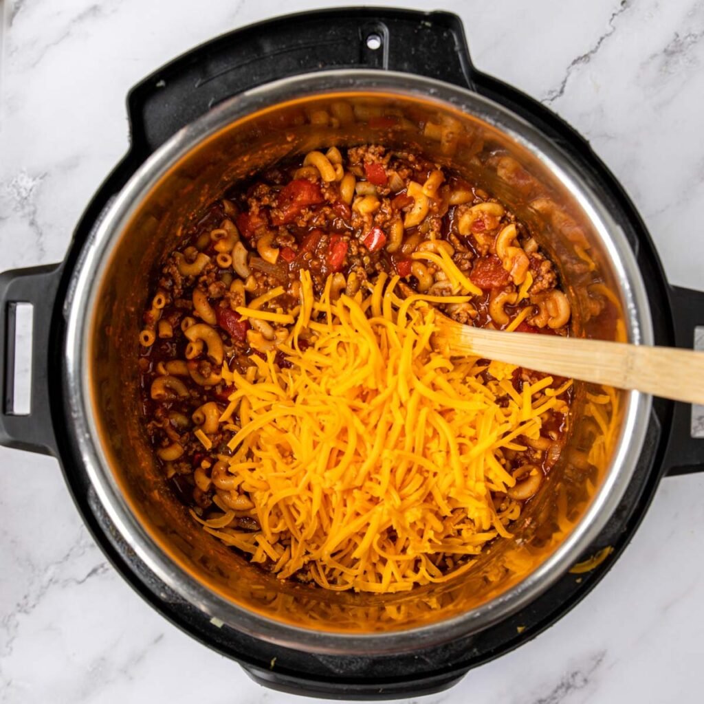 cheese on top of chili mac in the instant Pot