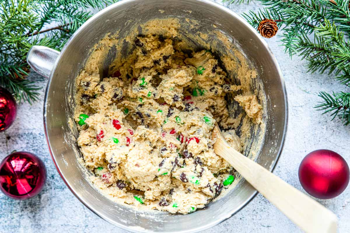 Holiday Chocolate Chip Cookie dough in a mixing bowl