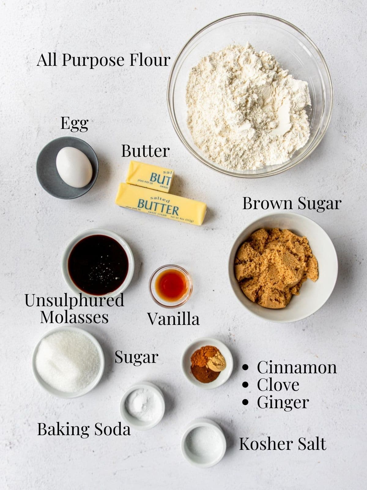 Ingredients on a table to make molasses cookies