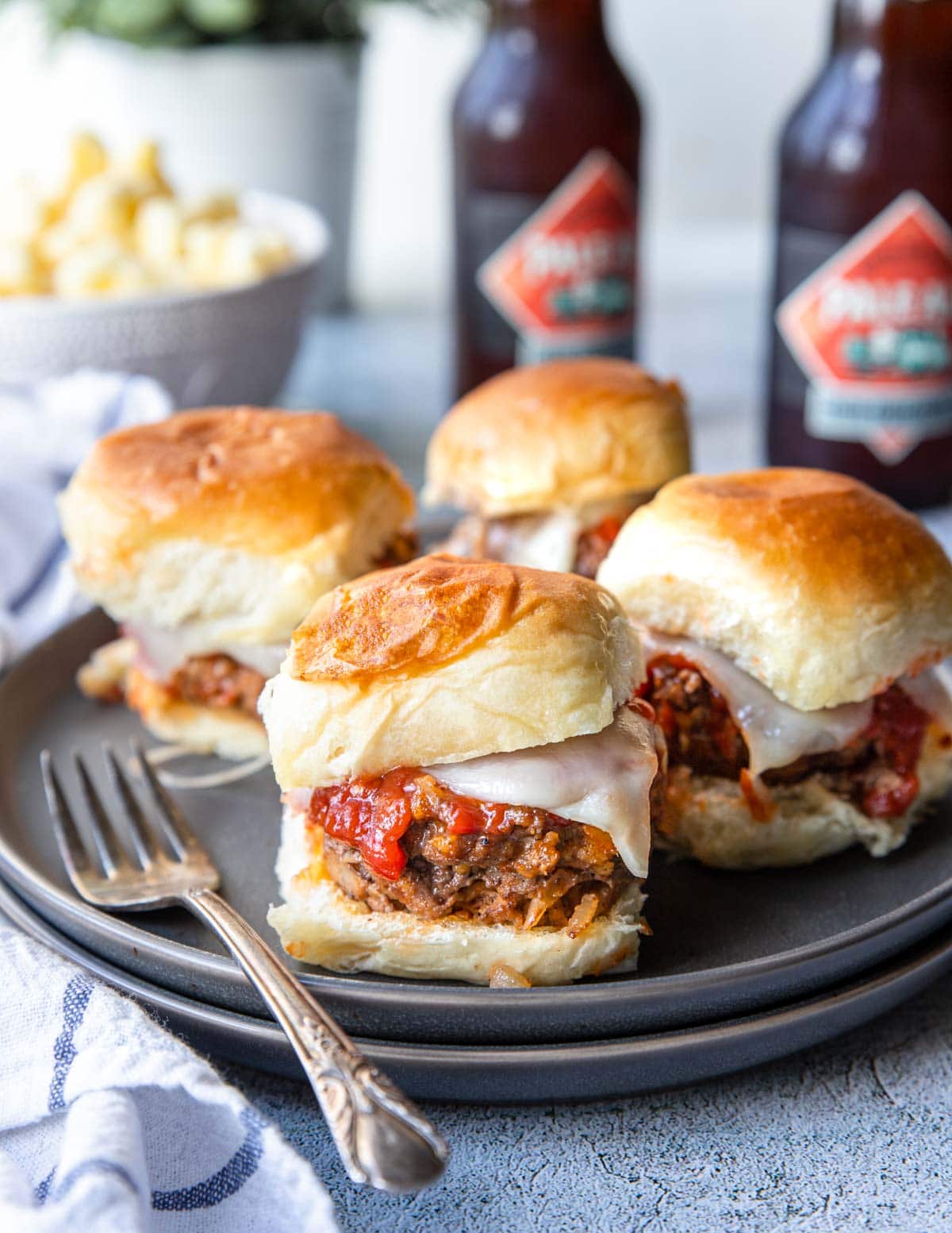 4 meatloaf slider sandwiches on a plate