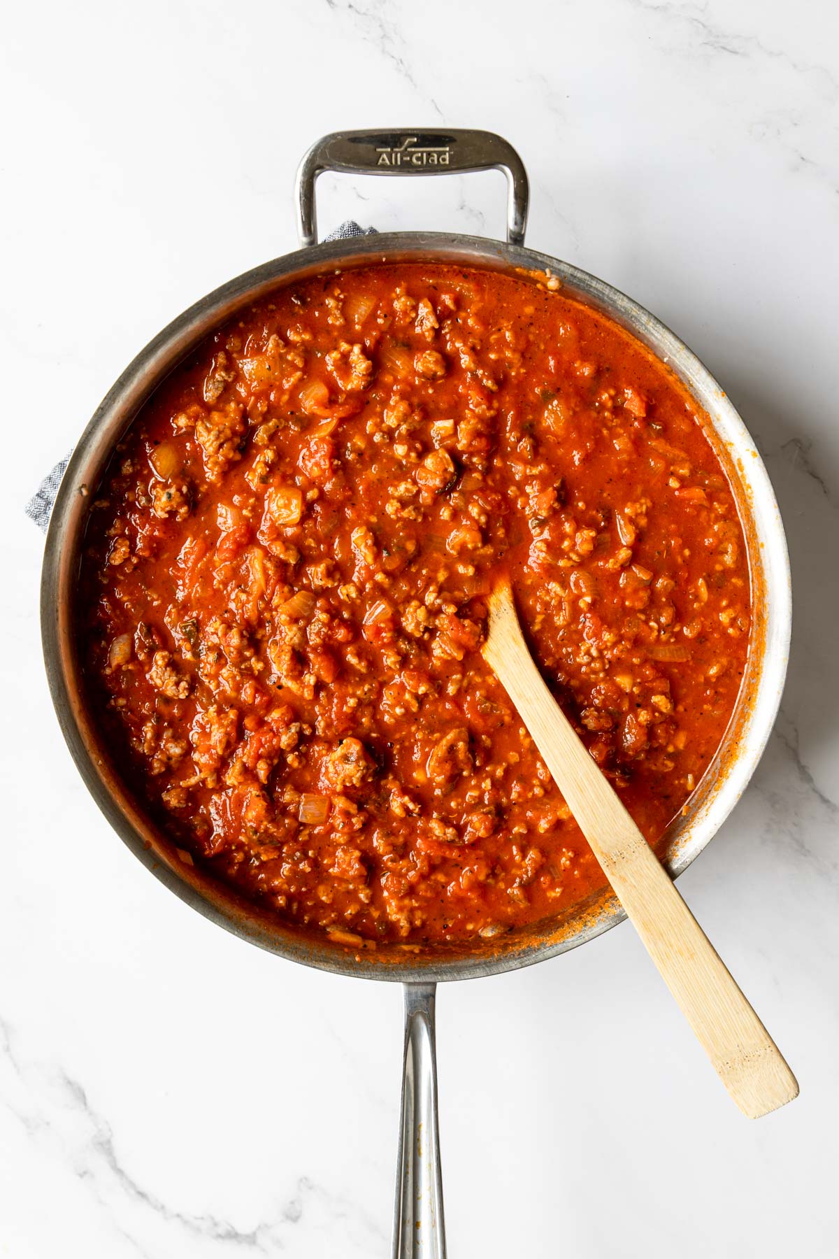 marinara sauce with italian sausage and herbs for lasagna