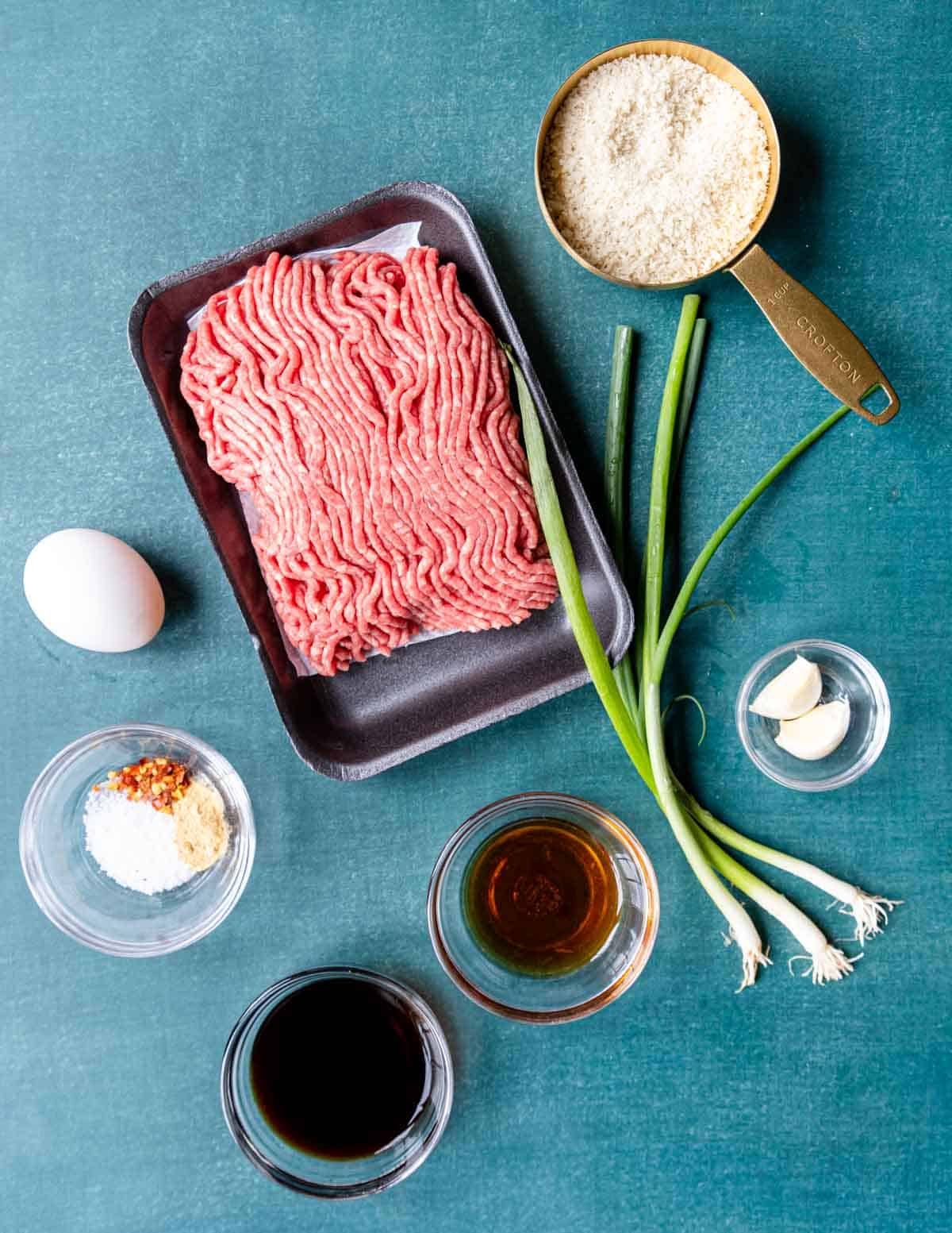 Asian flavored meatball ingredients on a table