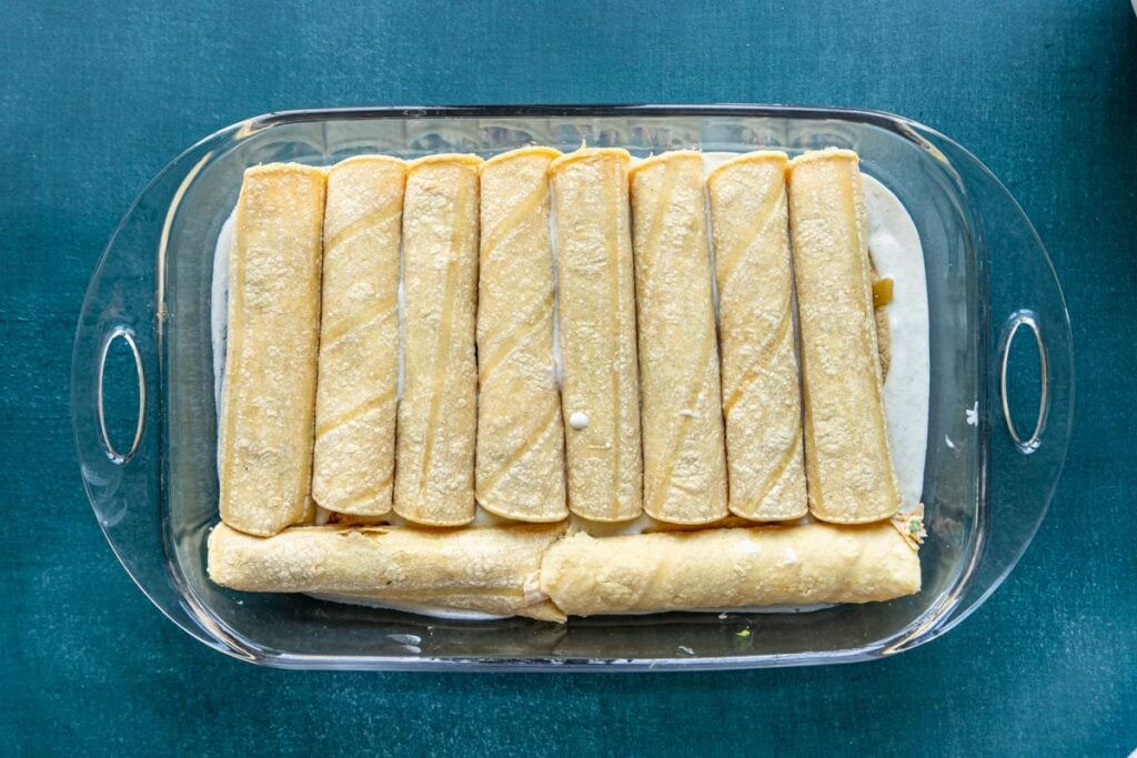 enchiladas rolled up in a pan