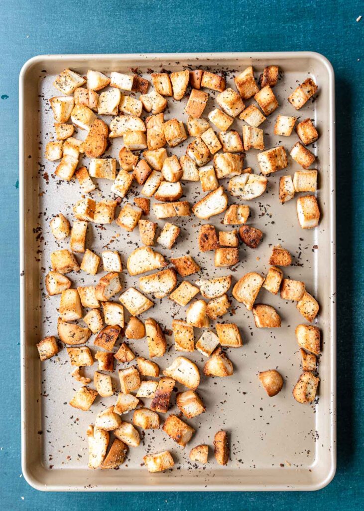 toasted croutons on a baking sheet