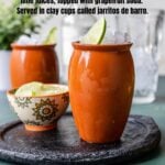 Cantarito in a clay cup with pinterest text overlay
