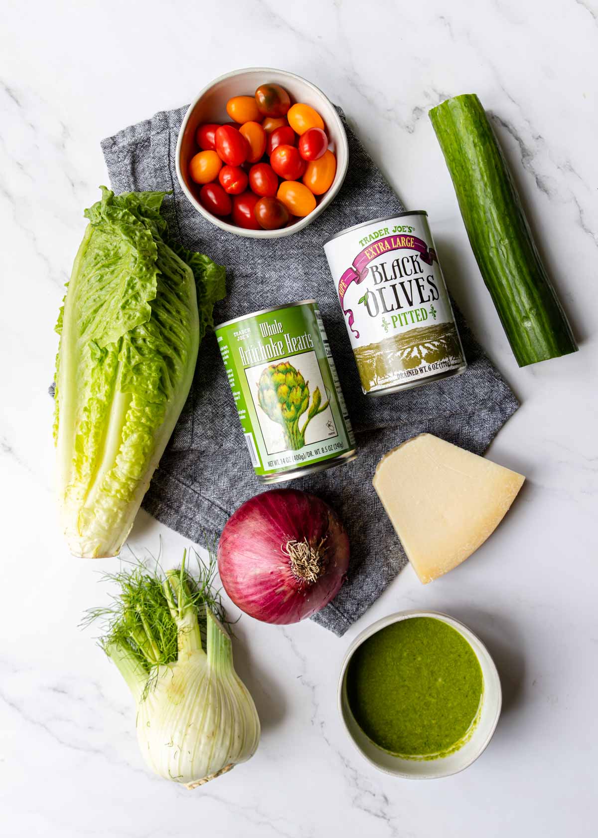 ingredients on a table to make Italian Salad