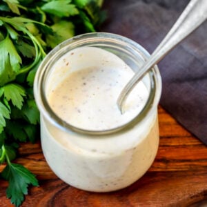horseradish cream sauce in a jar with a spoon
