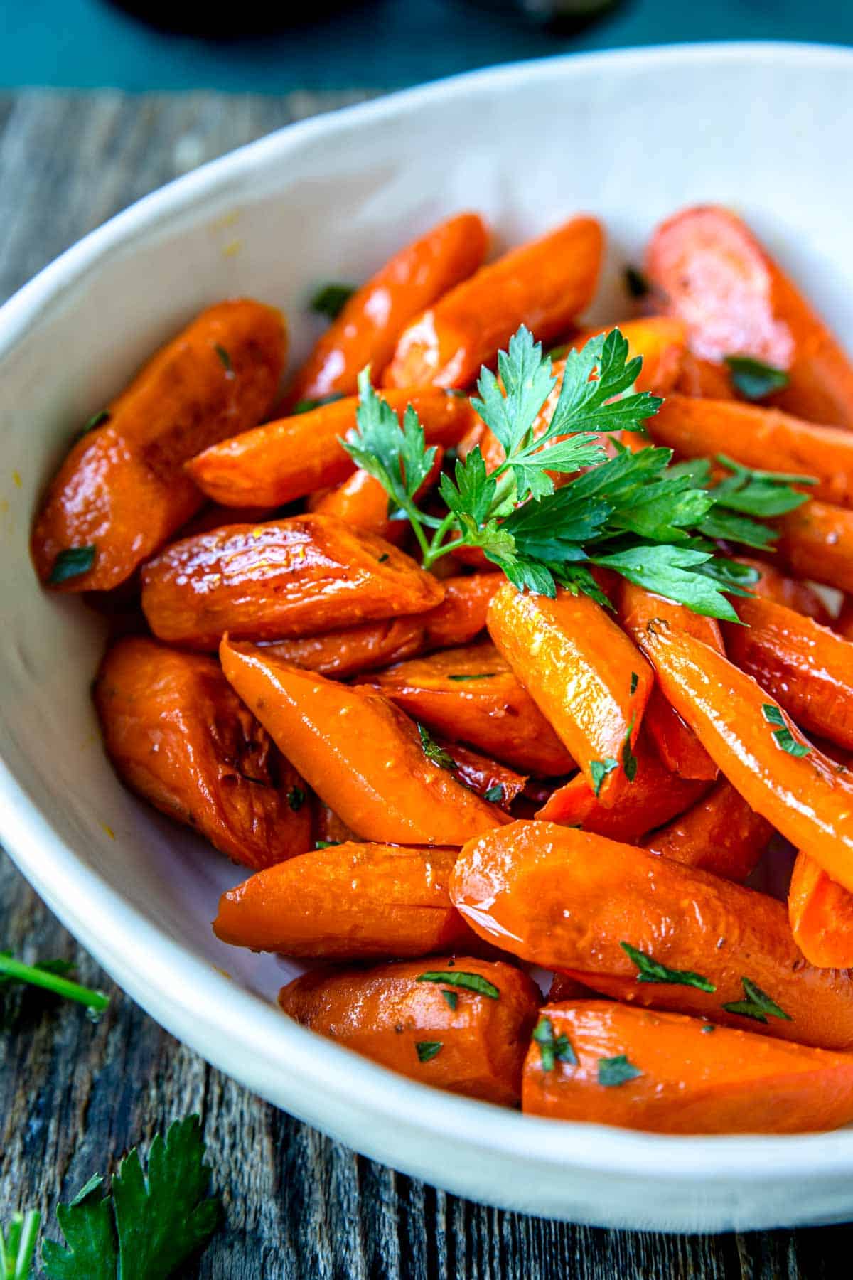 very close photo of roasted carrots in a bowl