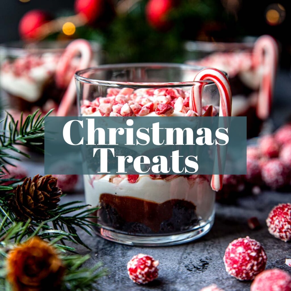 a Christmas Trifle in a glass with a candy cane on the side and text overlay Christmas Treats