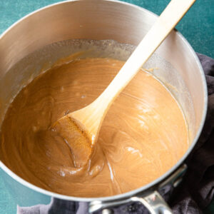 karo syrup, sugar and peanut butter in a pot