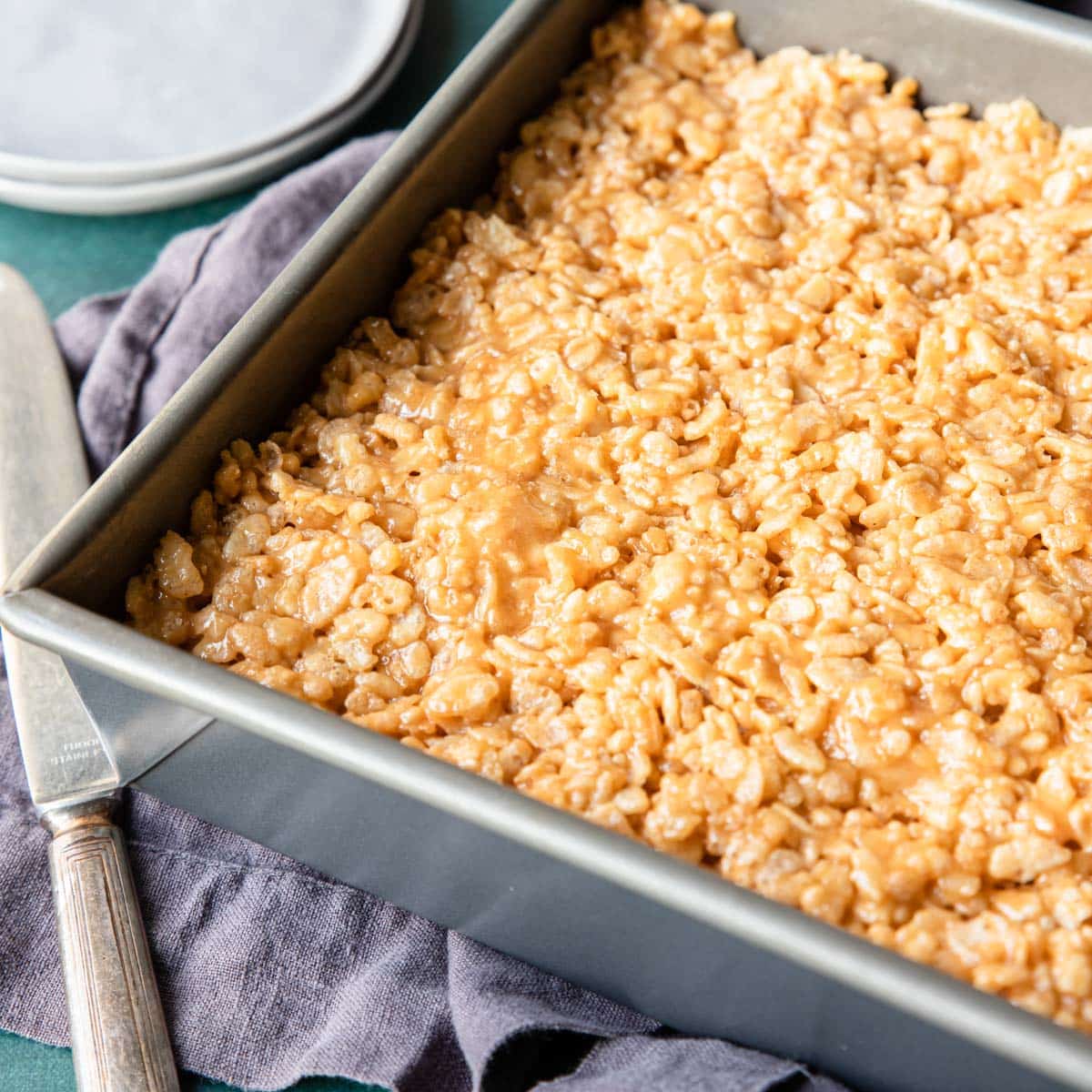 peanut butter rice Krispies pressed in an 8x8 pan