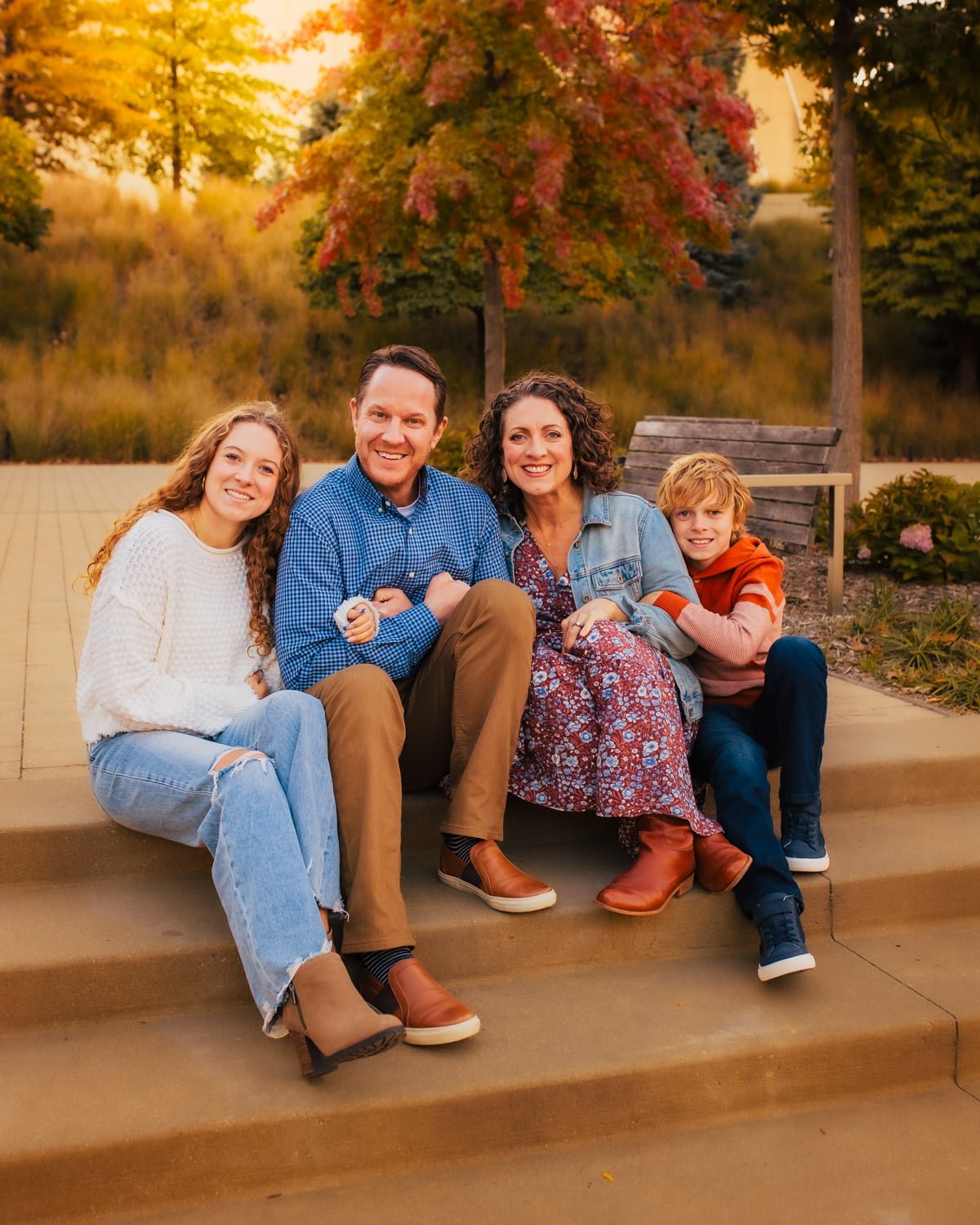 Susie Weinrich family sitting on stairs